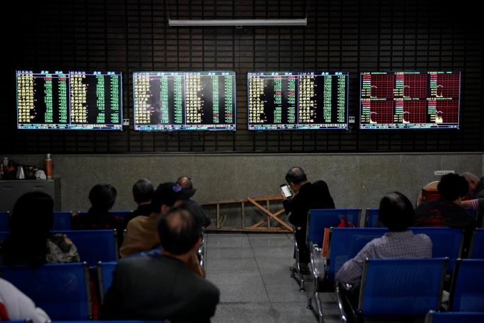 stock information Investors look at screens showing stock information at a brokerage house in Shanghai, China. Asian shares were mostly higher Monday as jobs numbers spurred a wave of buying late last week on Wall Street. REUTERS