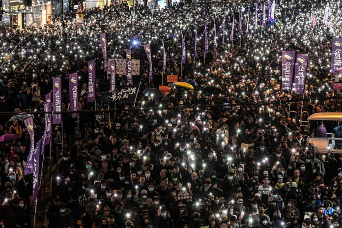 ‘Peaceful’ Hong Kong march marred by fire Protesters attend a Human Rights Day march in the district of Causeway Bay in Hong Kong, China on Dec. 8. REUTERS/LAUREL CHOR