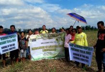 The seven farmers installed by personnel of the Department of Agrarian Reform Negros Occidental-South on the 11.1 hectares of landholding in Barangay Payao, Binalbagan town on Jan. 15. DAR NEGROS OCCIDENTAL-SOUTH