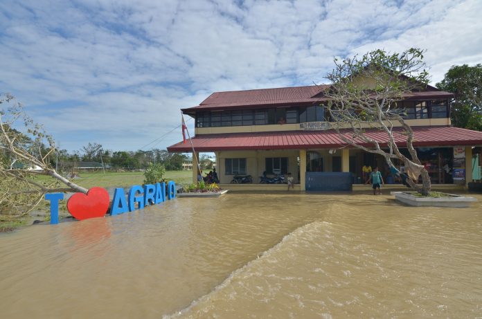Agbalo, Panay, Capiz Flood The front portion of a multi-purpose building in Barangay Agbalo, Panay, Capiz on Dec. 26, 2019 was inundated due to typhoon “Ursula.” As of Jan. 4, around 4,664 persons, mostly from this province, are still in evacuation centers, says May Rago-Castillo, information officer of the Department of Social Welfare and Development in Western Visayas. IAN PAUL CORDERO/PN