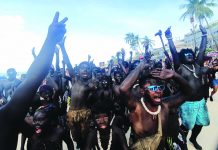 Free Ati-Atihan from litter – DENR Revelers paint themselves black with soot to imitate the native Atis tribesmen to celebrate the Ati-Atihan Festival in Kalibo, Aklan on Jan. 12. JUN AGUIRRE/PN
