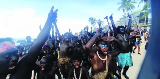 Revelers paint themselves black with soot to imitate the native Atis tribesmen to celebrate the Ati-Atihan Festival in Kalibo, Aklan on Jan. 12. JUN AGUIRRE/PN