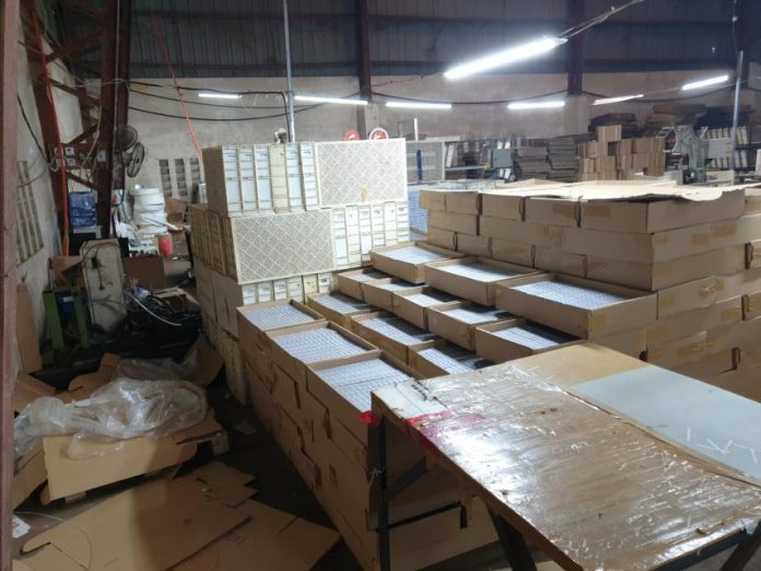 Bureau of Customs seizes three boxes of forged Bureau of Internal Revenue stamps, five lines of cigarette making machines, six lines of packing machines, one filter making machine, a mixer, a dryer, and raw materials for the manufacture of counterfeit cigarettes. BOC