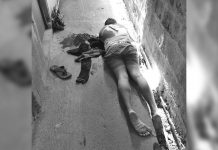 Bakeshop worker Jan Jan Lañada lies dead after being stabbed to death by his friend on Roosevelt Street, Barangay Zone II, Santa Barbara, Iloilo on Jan. 22. CONTRIBUTED PHOTO