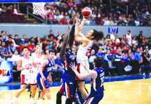 Barangay Ginebra San Miguel Kings' Japeth Aguilar attacks the defense of Meralco Bolts' Allen Durham for an inside hit. PBA PHOTO