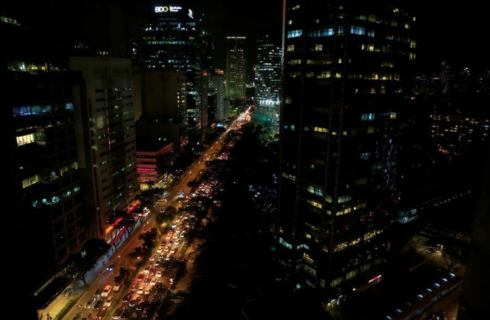Buildings Buildings are seen as vehicles pass through the financial district of Makati city, metro Manila, Philippines. REUTERS