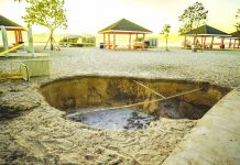 Magnitude 7.7 quake hits Caribbean off Jamaica A sinkhole is surrounded by police tape after it appeared when a powerful magnitude 7.7 earthquake struck in the Caribbean Sea between Jamaica and eastern Cuba, at Public Beach on West Bay, Grand Cayman on Jan. 28, 2020. AP