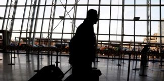 Travelers arrive at John F. Kennedy international airport in New York City, United States on Feb. 4, 2017. REUTERS/BRENDAN MCDERMID