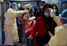 China virus death toll rises to 170 Medical workers take the temperature of passengers after they got off the train in Jiujiang, Jiangxi province, China on Jan. 29. REUTERS/THOMAS PETER