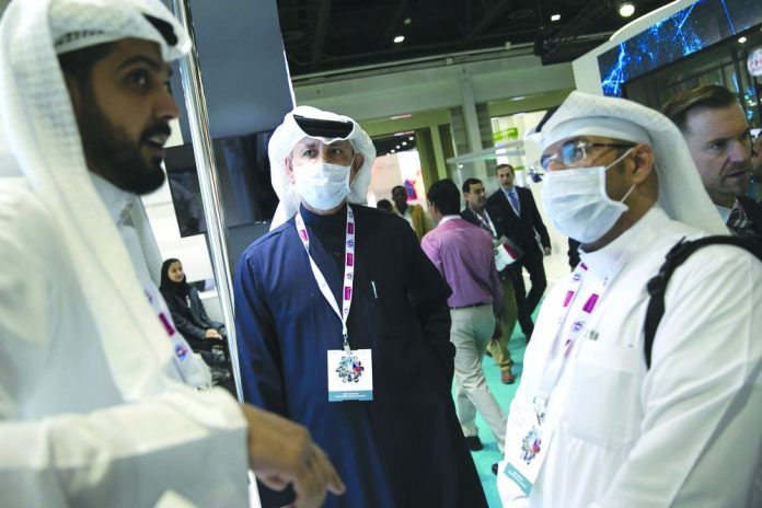 Chinese virus Visitors and exhibitors wear masks at the Arab Health Exhibition in Dubai, United Arab Emirates, Wednesday, Jan. 29, 2020. AP