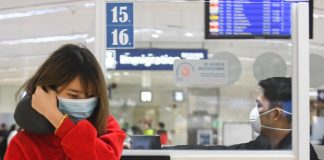 Personnel at the NAIA Terminal 1 in Parañaque City wear face masks as the country heightens measures to prevent the spread of the Novel Coronavirus from China. ABS-CBN News