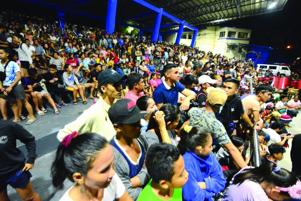 Hundreds of spectators flock the Iloilo Freedom Grandstand on Wednesday night as some of the participating tribes in this year's Dinagyang festival rehearse their dance performances for the opening salvo on Jan. 10, 2020.