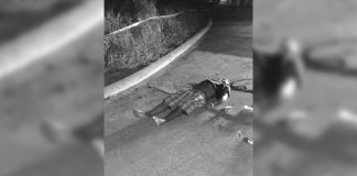 Drugs suspect Richard Tutop, 32, lies dead on the road in Barangay Mansilingan, Bacolod City on Thursday. Earlier, Tutop was reportedly abducted by unidentified men. POLICE STATION 7/ BCPO