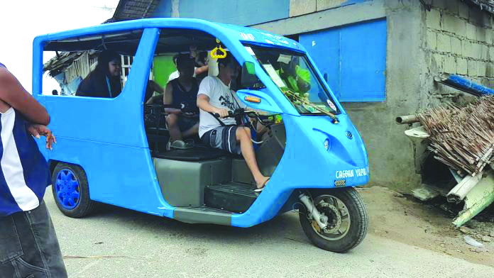 Electric passenger tricycle Electric passenger tricycle plies the street streets of Boracay in Malay, Aklan. The town’s local government unit has postponed the planned total phaseout of gasoline-powered tricycles in the world famous-island due to the extensive damage left by Typhoon Ursula. PHOTO FROM KATHLEEN URBI/YOUTUBE