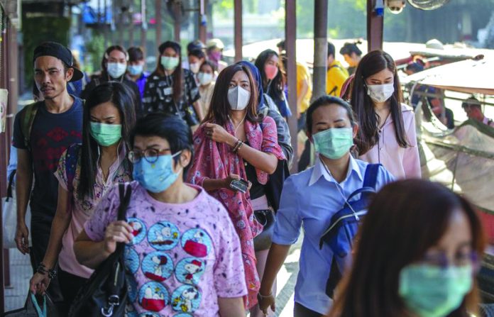 Face masks soars Boat passengers on a jetty wear face masks in Bangkok, Thailand, Tuesday, Jan. 28, 2020 to protect themselves from new virus infection. AP