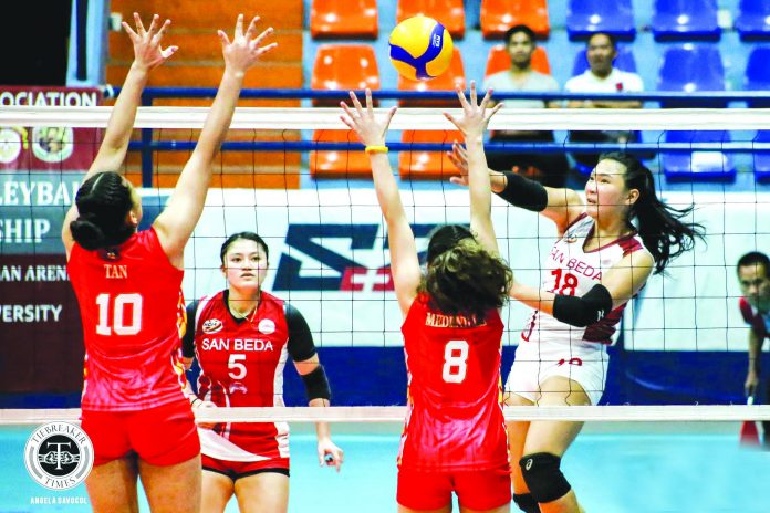 Franchesca Racraquin (No.18) scores 19 points built on 13 attacks and six service aces to help San Beda University defeat San Sebastian College on Jan. 21 at the San Juan Arena. TIEBREAKER TIMES PHOTO