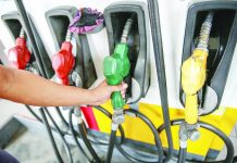 After hefty rollback, oil firms raise fuel prices