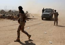 Houthi attack on Yemen military camp kills 60 Yemeni army soldiers secure a site in the south of the country after an attack last year. On Saturday, Iran-aligned Houthi militia attacked a military training camp in the Yemeni city of Marib, killing‮ ‬60 military personnel and wounding dozens others, Saudi state television said.‬‬‬‬‬‬‬‬‬ ALI OWIDHA/REUTERS