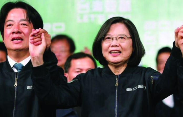 Incumbent Taiwan President Tsai Ing-wen and Vice President-elect William Lai attend a rally after their election victory, outside the Democratic Progressive Party headquarters in Taipei, Taiwan on Jan. 11, 2020. REUTERS