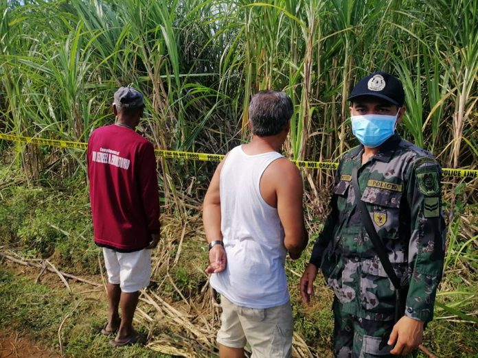 Authorities cordon the area where the body of Jemeiah Rose Oliveros, already in the state of decomposition, was found in Barangay Binubuhan, Bago City, Negros Occidental on Jan. 6. Police officers are still investigating the cause of her death. Bago City Police Office