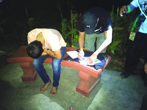 Jovy Treyes An antidrug officer inspects items recovered from Jovy Treyes. Treyes was nabbed after he sold a sachet of suspected shabu to a poseur-buyer in an entrapment operation in Barangay Singcang-Airport, Bacolod City. POLICE STATION 8/ BCPO