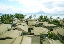 Taal alert status down to level 3 Residents clear ash from their roof in Agoncillo, Batangas, days after Taal Volcano’s eruption on Jan. 12, 2020. ABS-CBN NEWS