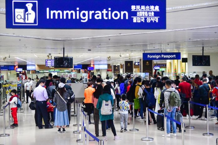 Passengers wear face masks at the Ninoy Aquino International Airport Passengers wear face masks at the Ninoy Aquino International Airport Terminal 1 in Parañaque City, as the country heightened its measures to combat the spread of the new coronavirus strain from Wuhan, China. MARK DEMAYO/ABS-CBN NEWS