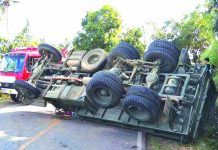 A Philippine Army truck turns turtle in Barangay San Juan, Barotac Viejo, Iloilo yesterday injuring at least 10 persons, including three soldiers and minors. CONTRIBUTED PHOTO