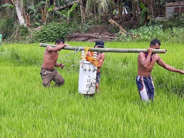 Line workers from various electric cooperatives help restore power in areas affected during the onslaught of typhoon “Ursula” in Western Visayas on Dec. 25. AKEAN FORUM