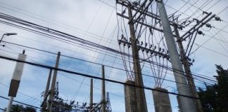 Power lines of Central Negros Electric Cooperative in Bacolod City. The reduction in generation cost has brought down residential power rates in three electric cooperatives in Negros Occidental this January. PNA BACOLOD FILE PHOTO
