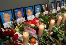 Protests spark after Iran admits downing Ukrainian plane Flowers and candles are placed in front of the portraits of the flight crew members of the Ukraine International Airlines Boeing 737-800 plane that crashed in Iran, at a memorial at the Boryspil International airport outside Kiev, Ukraine on Jan. 11. REUTERS/VALENTYN OGIRENKO