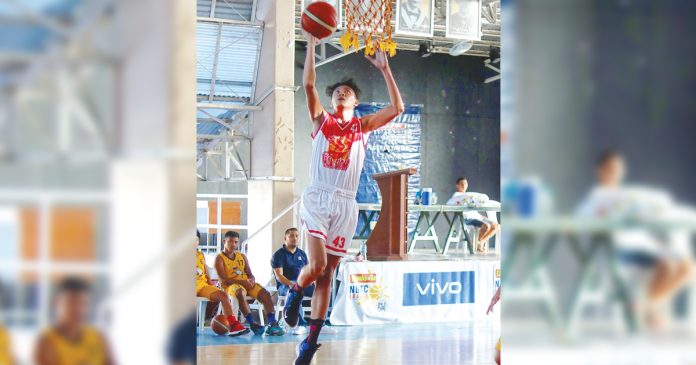Red Phoenix’s Dave Bagatnan Red Phoenix’s Dave Bagatnan scores an uncontested layup. WINMEL LEE