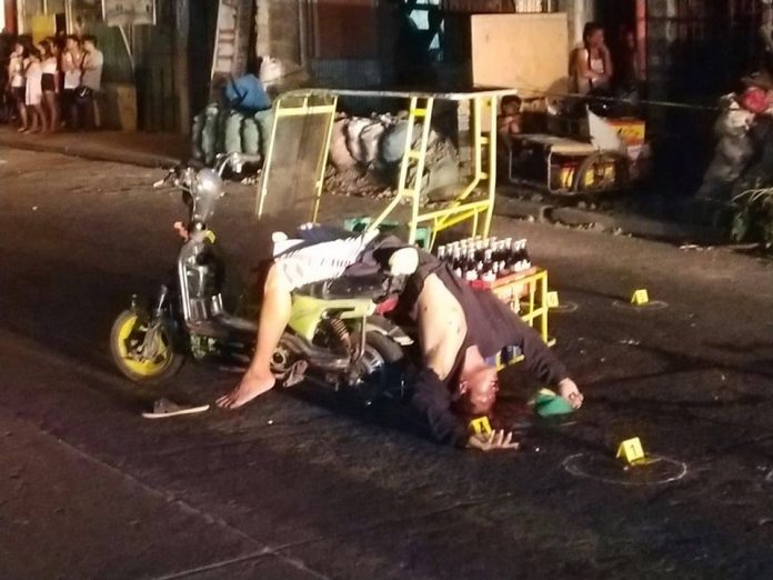 Robbery suspect Johnny Lizzo dies on his electric tricycle loaded with several cases of soft drinks. Gunmen peppered him with bullets early evening on Jan. 18. BCPO