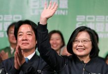 Incumbent Taiwan President Tsai Ing-wen (right) and Vice President-elect William Lai wave to their supporters after their election victory at a rally, outside the Democratic Progressive Party headquarters in Taipei, Taiwan on Jan. 11. REUTERS/TYRONE SIU