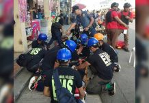 Task Force Ati-Atihan holds shooting simulation exercise A police officer and emergency rescuers assist a victim during a shooting simulation exercise in Kalibo, Aklan on Jan. 13 as preparation for the upcoming Ati-Atihan Festival. PHOTO KALIBO PNP