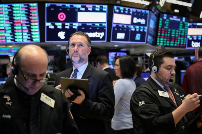 Traders Traders work on the floor of the New York Stock Exchange in New York, United States. REUTERS