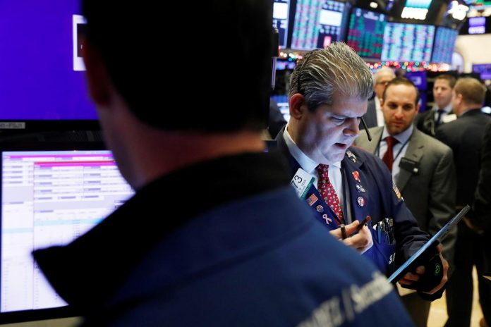 Traders Traders work on the floor of the New York Stock Exchange shortly after the opening bell in New York, United States. World stocks on Tuesday closed out a notably profitable year, with Wall Street recording its best annual performances since 2013, boosted by hopes for a trade deal between United States and China. REUTERS