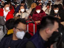 CHINA. Travelers wear face masks as they sit in a waiting room at the Beijing West Railway Station in Beijing, Tuesday, January 21, 2020. A fourth person has died in an outbreak of a new coronavirus in China, authorities said Tuesday, as more places stepped up medical screening of travelers from the country as it enters its busiest travel period. AP
