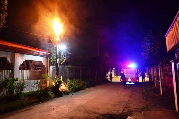 ANOTHER FIRE. This electricity post on Remonville Subdivision in Barangay Tabuc Suba, Jaro, Iloilo City caught fire on Jan. 2. Residents were thankful that firemen responded quickly enough. The fire was prevented from spreading.