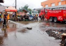 DILG-Bacolod reminds barangay officials to sustain cleared roads An officer of the Bureau of Fire Protection sprays water on a road cleared of erring structures. Recently, the Department of the Interior and Local Government in Bacolod City reminded village officials of their roles to sustain the city’s gains during the 60-day road-clearing operations. CONTRIBUTED PHOTO/PN