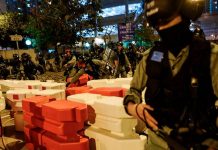 ‘Homemade bomb’ explodes at HK hospital Police clear barricades as residents protest in the Fanling district, Hong Kong on Jan 26. AFP/PHILIP FONG/CHANNEL NEWS ASIA