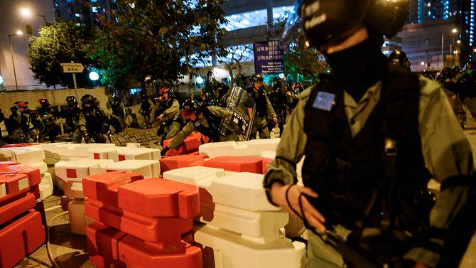 world Hong Kong Police clear barricades as residents protest in the Fanling district, Hong Kong on Jan 26. AFP/PHILIP FONG/CHANNEL NEWS ASIA