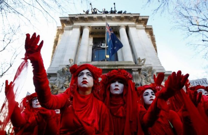 world London “Red Brigade” activists gesture as they participate in a demonstration against the Australian government’s alleged inaction over climate change despite the bushfires crisis, outside the Australian Embassy in London, Britain on Jan. 10. REUTERS/HENRY NICHOLLS