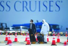There are worries over allowing former Diamond Princess passengers to roam freely around Japan's notoriously crowded cities, even if they have tested negative for the coronavirus. AFP