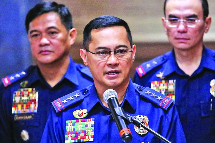 “The 357 police officers on the list will be given a chance, I have asked the President for time for the PNP to validate and evaluate the list,” says Philippine National Police chief Archie Gamboa (center). GMA NEWS