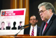 US says Chinese military stole masses of Americans’ data Attorney General William Barr speaks during a news conference, Monday, Feb. 10, 2020, at the Justice Department in Washington, as Principal Associate Deputy Attorney General Seth Ducharm looks on. AP