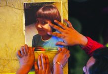 Killing of 7-year-old stokes anger in Mexico Relatives post a photo of Fatima, a 7-year-old girl who was abducted from the entrance of the Enrique C. Rebsamen primary school and later murdered, at her home in Mexico City, Monday, Feb. 17, 2020. AP