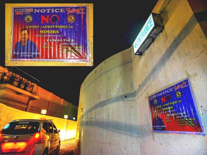 NO MINORS ALLOWED. Are motels, lodging houses and similar establishments in Iloilo City complying with Regulation Ordinance ‎2015-447 that bars minors from entering their premises? Task Force on Morals and Values Formation vows to see to it that they do. Photo shows a city government poster at the entrance of a motel issuing a public warning. IAN PAUL CORDERO/PN