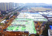The Huoshenshan temporary field hospital under construction is seen as it nears completion in Wuhan in central China's Hubei Province, Sunday, Feb. 2, 2020. CHINATOPIX VIA AP