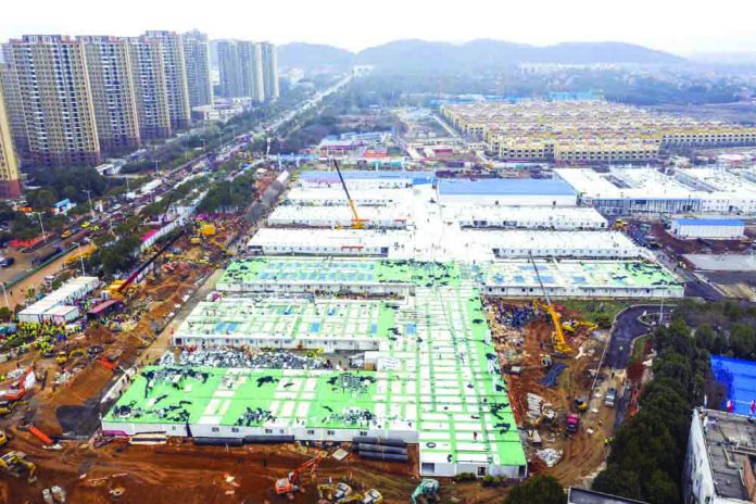 Huoshenshan temporary field hospital The Huoshenshan temporary field hospital under construction is seen as it nears completion in Wuhan in central China's Hubei Province, Sunday, Feb. 2, 2020. CHINATOPIX VIA AP
